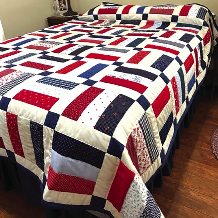 The hand quilted quilt for live auction at St. John.