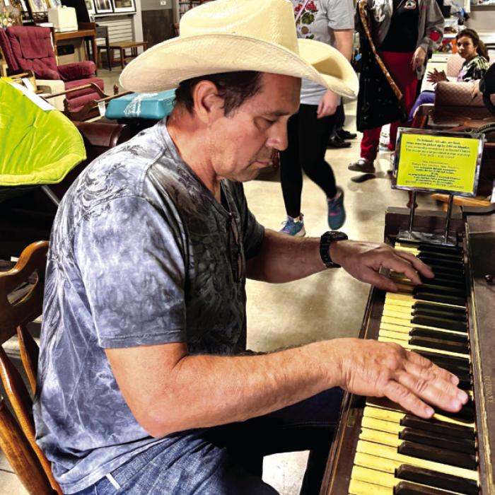 Kevin Wymer took a turn at the keyboard, engrossed in his own jazz compositions. Wymer, of Giddings, had helped purchase another piano earlier in the week for an assisted-living facility where he plays on occasion. He decided to pass on the 1948 Kurtzmann at Second Chance.