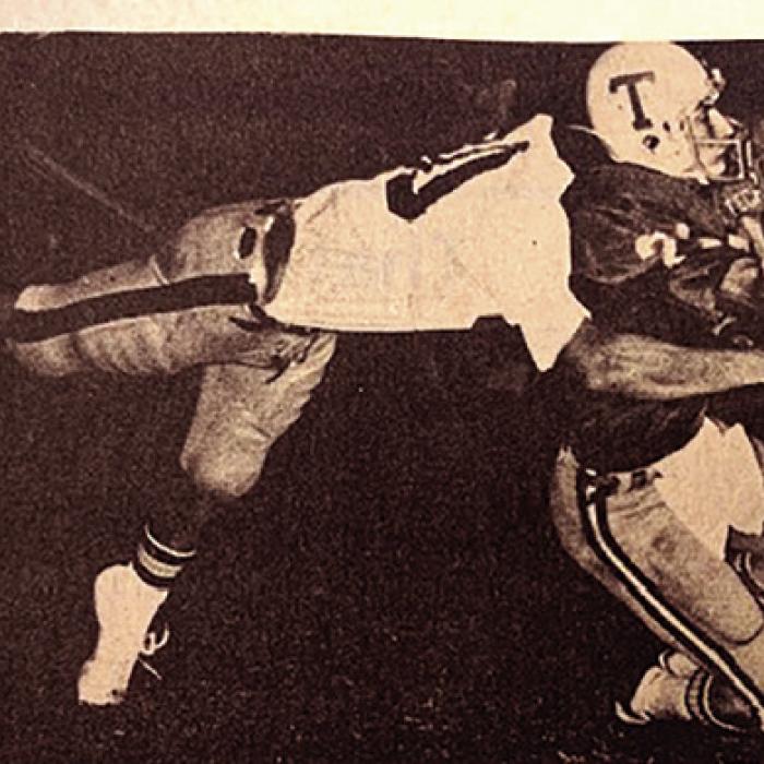 Bill Miller making a tackle during his days as a standout defensive back at Texas Lutheran College.