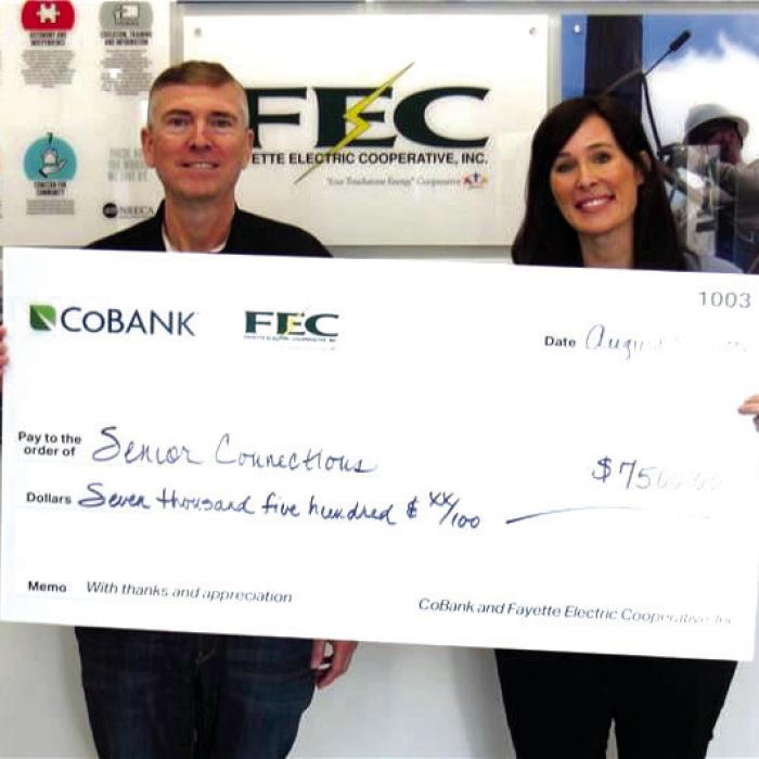 Navidad Valley Community Connections DBA Senior Connections received a $7,500 grant from FEC and CoBank. Pictured above are FEC General Manager/CEO Doug Lambert and Senior Connections Executive Director Amanda Kridel.