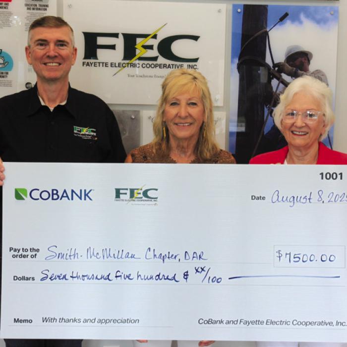 Smith-McMillan Chapter, Daughters of the American Revolution (DAR) received a $7,500 grant from FEC and CoBank. Pictured above are FEC General Manager/CEO Doug Lambert, Smith-McMillan Chapter, DAR Treasurer Jacquelyn Head, and Smith-McMillan Chapter, DAR Chapter Regent Carolyn Caflisch.
