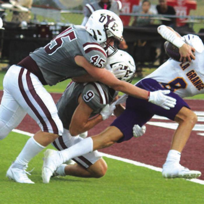 La Grange’s Klayton Michalka surges his way into the endzone for the Leps’ first touchdown of the 2025 season Friday in Cameron. Photo by Jeff Wick