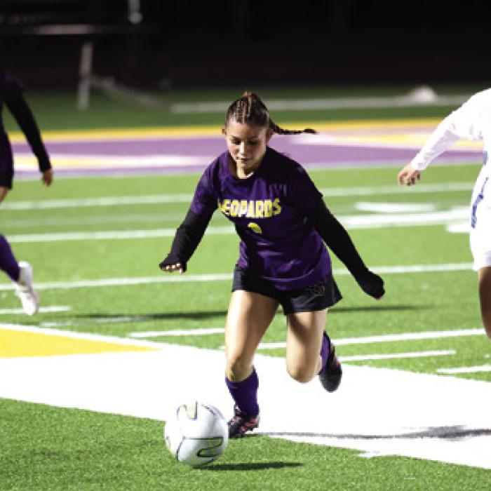 La Grange’s Miriam Lopez and Eliza Luna in action Friday. Photo by Katy Michalke