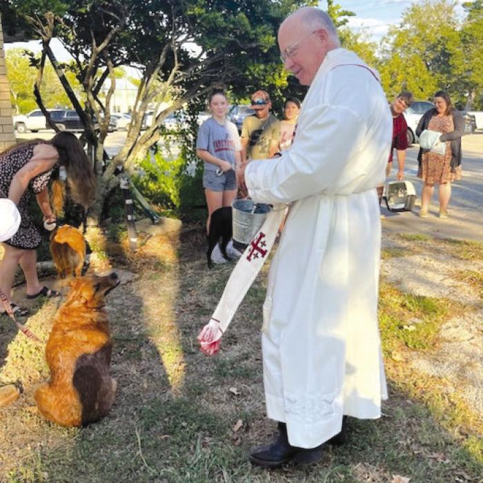 Father Sauser at the St. Francis Pet Blessing.