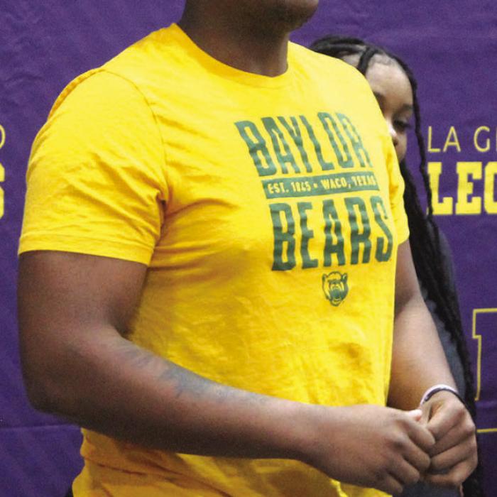 Triumph Over Tragedy: Woods Signs With Baylor