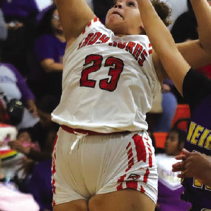 Arianna Vincent goes up for a basket in Friday’s 46-36 loss to Weimar in a district game. Photo by Audrey Kristynik