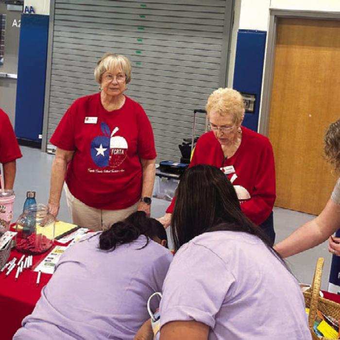 Teachers signing up for more information on FCRTA.