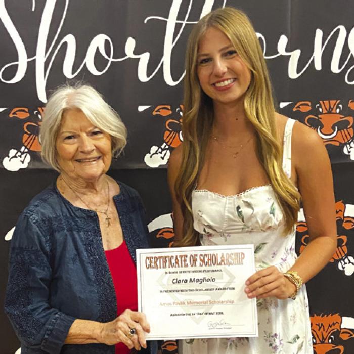 Pictured is Fayette County Czech Heritage Society President, Betty Danner, with scholarship recipient Clara Magliolo.
