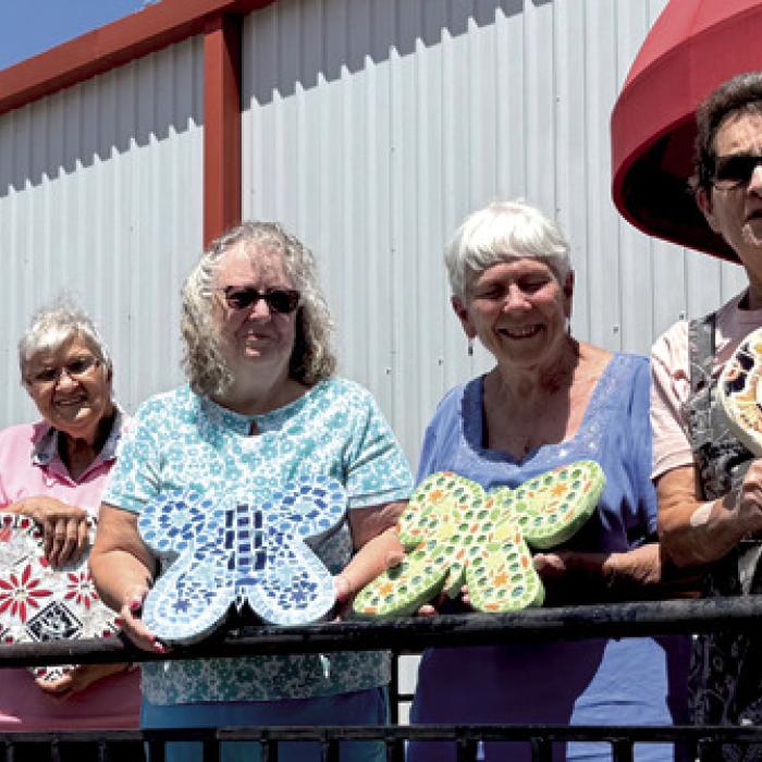 Some students in the mosaic class for Artful Friday grouted their projects recently, pictured left to right are Fernanda Kirkwood, Cynthia Meyer, Kitra Ruiz, Maryanne Jurica, and instructor Stephanie Shroyer.