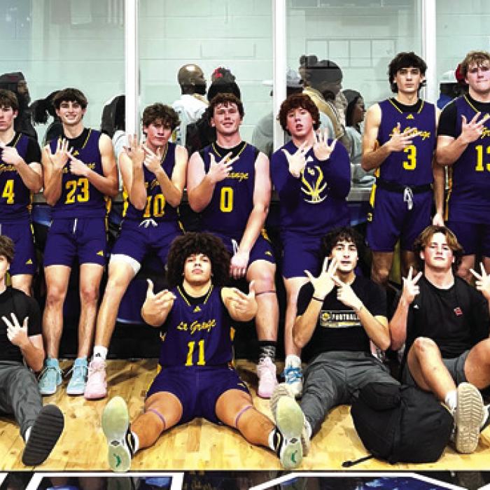 The members of the La Grange boys basketball team pose after Tuesday’s district-title-clinching victory at Navasota.