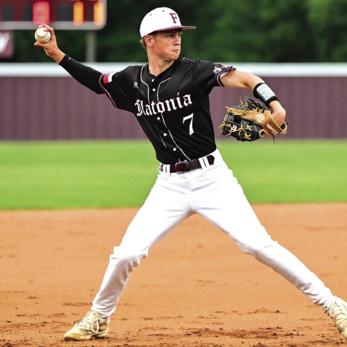 Freshman third baseman Kullen Kutac make the throw over to first for an out last week. Photo by Stephanie Steinhauser