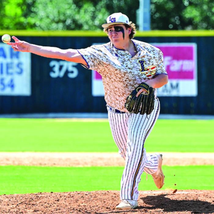 Bradyn Prasek relieves Braxton Dahse in Game 3 of the series with Sealy. La Grange won the series and advances to Area. Photo by Stephanie Steinhauser