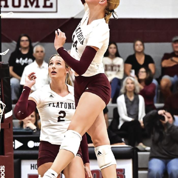 Freshman Quinn Arnett hits for Flatonia. Photo by Stephanie Steinhauser