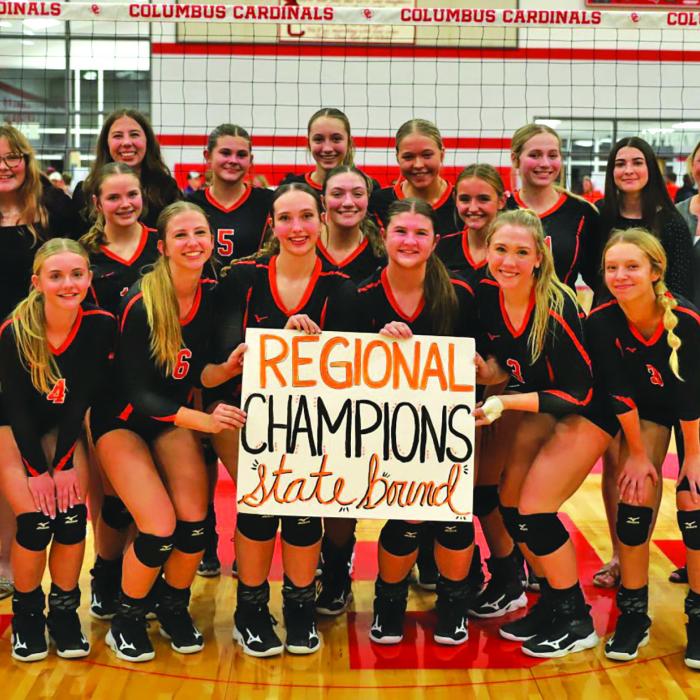The members of the Schulenburg volleyball team celebrate after Tuesday’s regional final win over Flatonia in Columbus. Photo by Audrey Kristynik