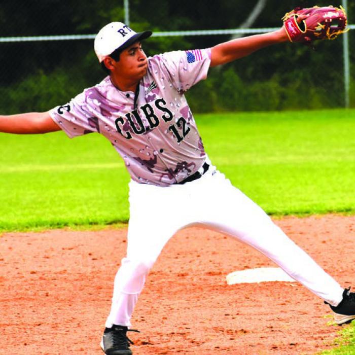 Luis Villareal makes a throw to first in Tuesday’s game. Photo by Paul Kipp