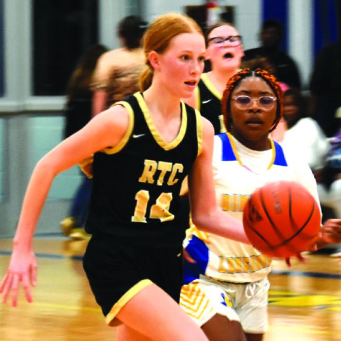 Round Top-Carmine’s Morgan Nelius dribbles the ball in Friday’s game against Dime Box. Photo by Paul Kipp