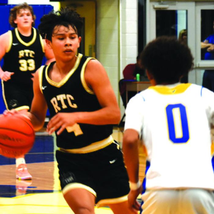 Round Top-Carmine’s Facundo Cerda drives down the court in Friday’s game against Dime Box. Photo by Paul Kipp