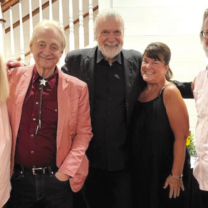 World renowned guitarist Beppe Gambetta joined by fans from left: Cindy Stephens, acclaimed pianist Ezra Charles, Beppe, Sue Patterson and Jerry Herring.