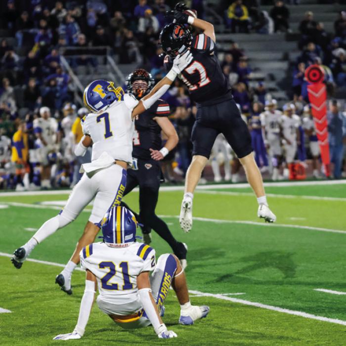 Caden Herzik snags an interception.