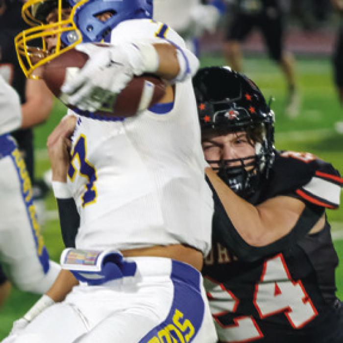 Mason Kunschick brings down a Freer rusher.