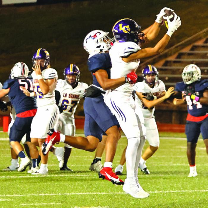 La Grange senior Nate Scott snags this pass Thursday. Photo by Darrell D. Gest