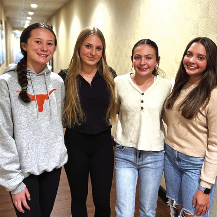 The Girls’ 200 Freestyle Relay broke their week-old record on Friday and shattered it again in Saturday’s finals. With all members swimming sub-30 splits, the relay posted a new record of 1:55.21 and placed 9th overall. Pictured above, left to right, are Eleanor Carey, Paige Michalke, Adysen Janacek and Celeine Fabre. Photo by Katy Michalke