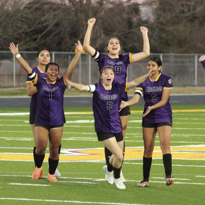 The five La Grange girls soccer players who were sent out for penalty kicks Friday react towards the sideline after they won. Front row, left to right – Kaylee Soto (who had a goal in regulation and then scored her PK) and Riley Lowe (who scored the game-winning PK). Back row, Michelle Leal (who didn’t need to kick because the Leps were already up 3-0), Trinity Yanis (who scored on her PK) and Florencia Barron. Photo by Jeff Wick