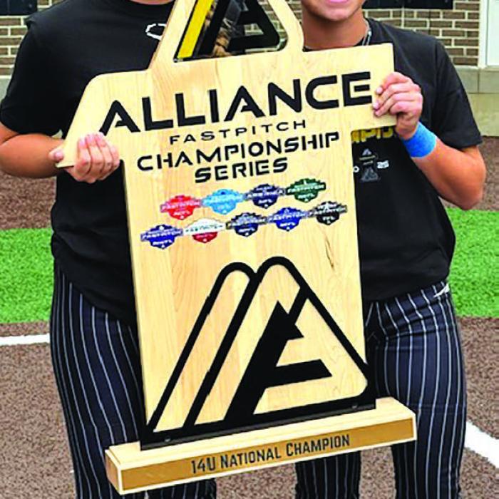 Here is a picture of La Grange’s Brooke Ulrich, left, and Giddings’ Landry Mutscher, right, after they helped the Texas Bombers win the Alliance Fast Pitch National Championship in Indiana July 31.