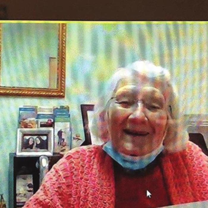 Longtime Flatonia resident Martha Tauch, who turned 104 on Dec. 30, grins at the computer screen during the first Zoom call of her long life.