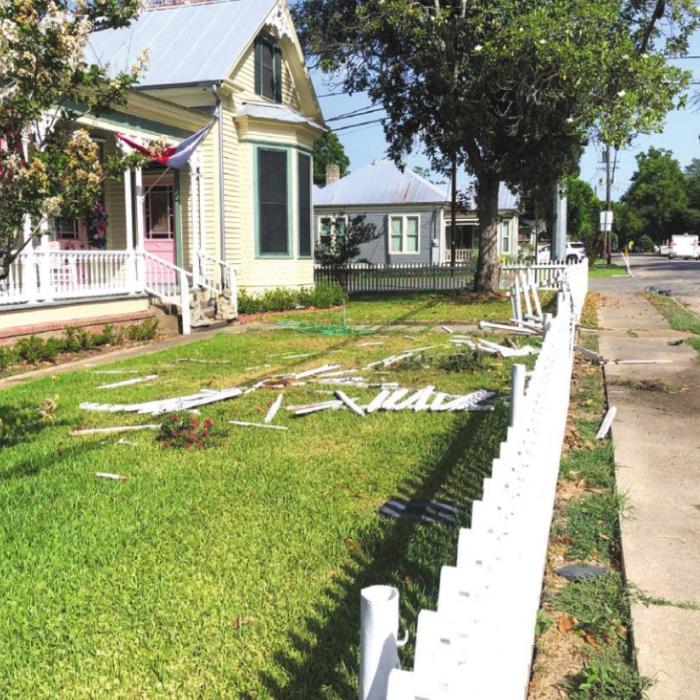 A two-vehicle accident caused fence damage Monday morning in Fayetteville.