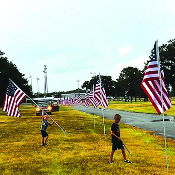 Lehmanns Continue Flag Tradition at Fairgrounds