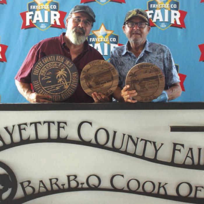 Overall Reserve Champions – The “Navaque” team of, left to right, James Nava of Bastrop and his father James Nava Sr.