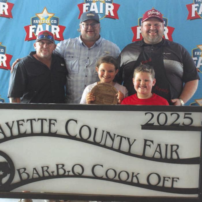 First Place Chicken – The “Good and Ready” team of, left to right, Tiger Hall, Michael Tofel and David Tofel, and front, Lillian and Frank Tofel.