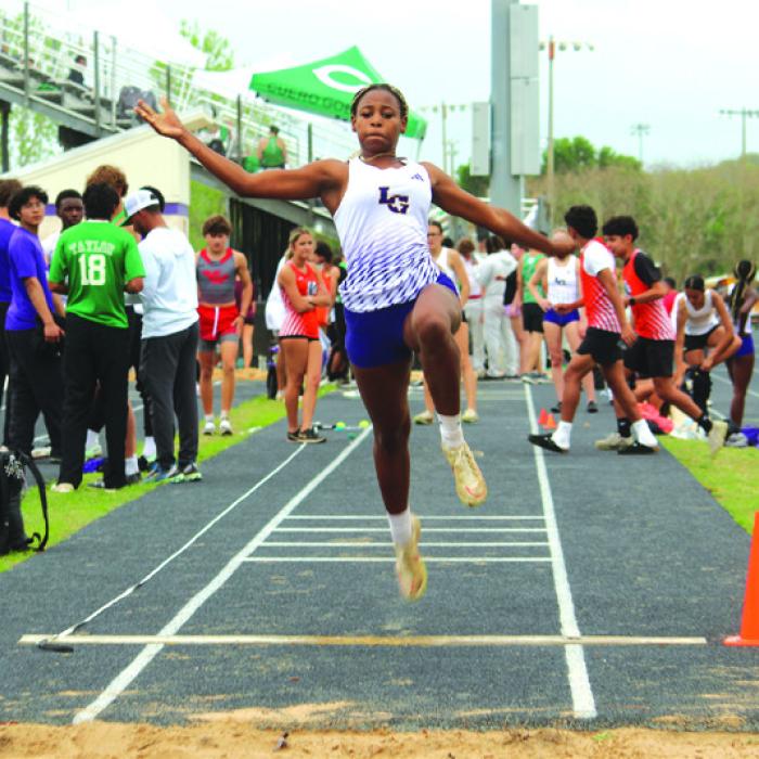 La Grange’s Jace Baptiste leaps for the pit in the varsity girls long jump Thursday. She was eighth with a leap of 15-2.25. We’ll have full results in Tuesday’s Record. Photo by Jeff Wick