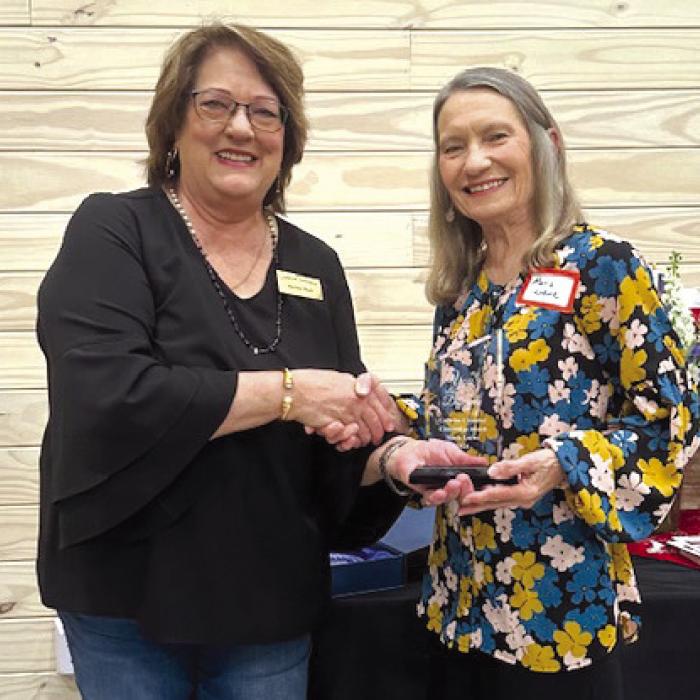 Marie Loewe, right, was presented the Carmine Chamber of Commerce Citizen of the Year Award by Marlene Waak.