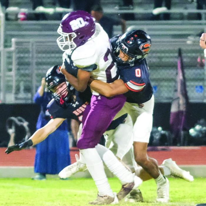 Schulenburg defensive back Jakele Houston executes a touchdown- saving tackle against Flatonia running back Adrian Anderson, who had an open field in front of him. Photo by Andy Behlen