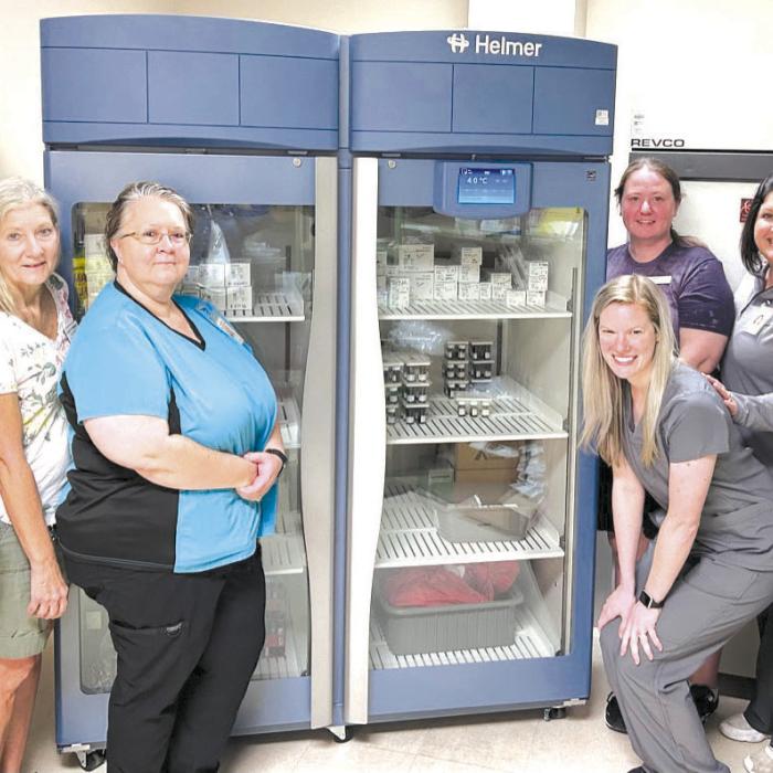 Second Chance Funds New Laboratory Refrigerator For St. Mark’s Medical Centerr; Gayle Schielack, SCE Store Director; Stacey Weyenberg, MLT, St. Mark’s; Valerie Otto, MT, St. Mark’s; (back row) Stacy Cada, SCE Asst. Store Director; Amanda Fuchs, MT, Director, St. Mark’s Laboratory Services; and Linda Morrison, SCE Board Secretary.