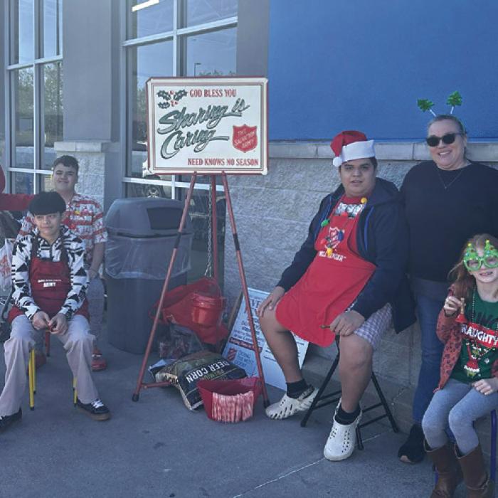 La Grange special education teacher Jeannette Sullivan, special education director Codi Kadlecek and LGISD students got the chance to give back over the Christmas holidays by ringing the bell for the Salvation Army.