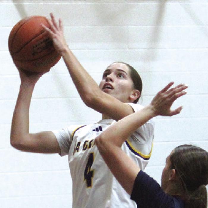 La Grange’s Macie Collier goes up a basket earlier this season. Photo by Jeff Wick