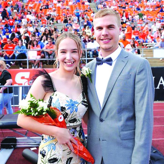 Dustin Canik (right) of Fayetteville and his campaign partner Megan Herzog (left) of Spring were both named Sam Houston State University Homecoming First Runners-up for Homecoming King and Queen. SHSU Homecoming candidates are voted on by all students of the University.