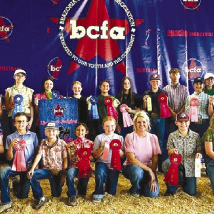 Pictured front from left: Kinley Kutac, Tate Fritsch, Joe Carrales, Emma Zweschper, Abigale McBride, Coach Kaci Carrales, Hudson Holub, Hayleigh Pizzitola, and Hunter Gabler; back row: Coach JoJo Carrales, Crockett Guenther, Laramie Laake, Tatum Fritsch, Alexis Berckenhoff, Kaisley Janecka, Adalyn Carrales, Addison Berckenhoff, Holden Holub, Kullen Kutac, Dylan Zweschper, Hailey Janish, Abraham McBride, Madyson Holub, and Julia Melton.