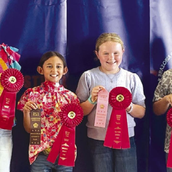 Reserve Champion Junior Team: Kinley Kutac, Emma Zweschper, Abigale McBride, and Hudson Holub.