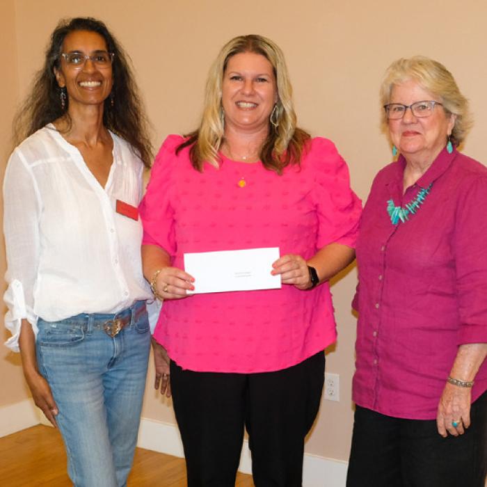 Lyndsey Vasek, center, presented a grant check to the James Dick Foundation for the Performing Arts, represented by Keelia Ritch and Pat Johnson.