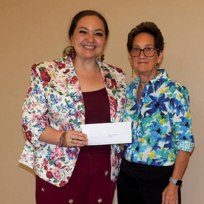 Nicole Gabler, left, presented a grant check to Navidad Valley Community Connections (Senior Connections), represented by Stephanie Shroyer.