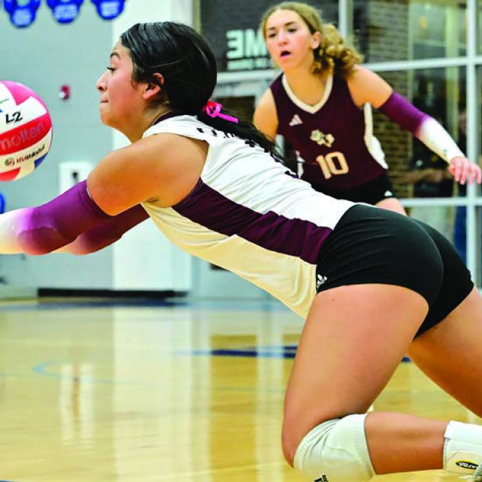 Flatonia’s Elzah Herrera digs the ball in Game 1 of Tuesday night’s bidistrict victory over Yorktown. Photo by Stephanie Steinhauser