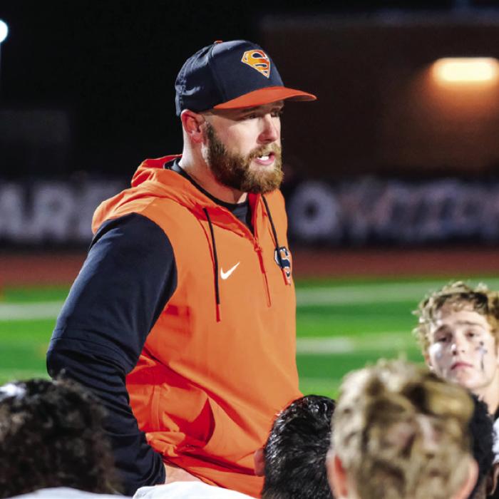 Luke Hobbs talks to his players at the conclusion of their second round playoff loss to Marlin in November. Photo by Andy Behlen