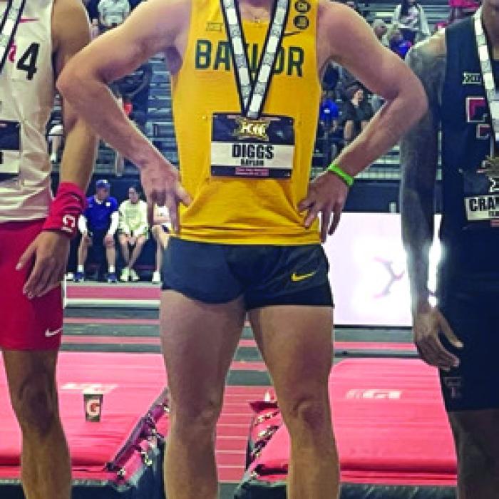 Austen Diggs on the medal stand at the 2026 Big 12 Conference Indoor Track &amp; Field Championships in Lubbock.