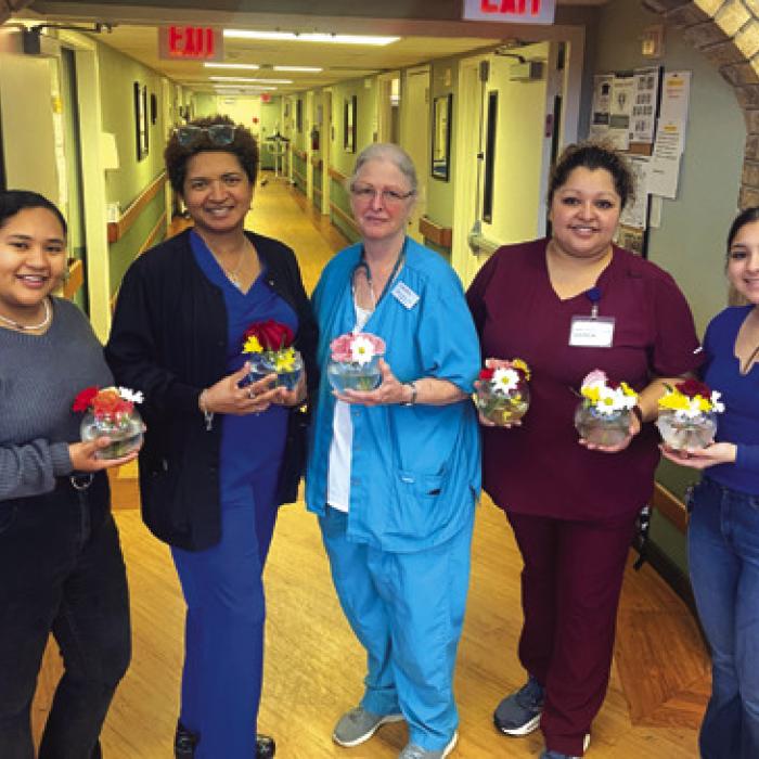 Leo Club Members Make Flower Arrangements For Care Inn Residents For Valentine’s Day