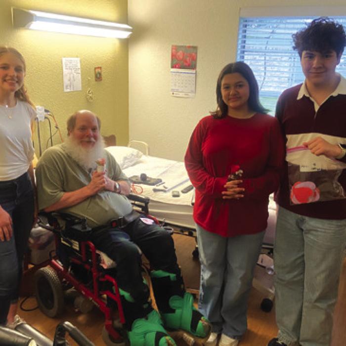 Leo Club Members Make Flower Arrangements For Care Inn Residents For Valentine’s Day