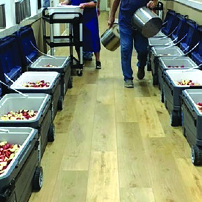 Prepping 900 lbs. of potatoes for the bazaar.